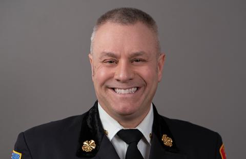 headshot of a man in fire chief uniform