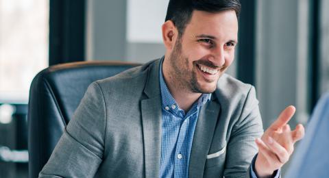 Man having a business meeting and signing a contract.