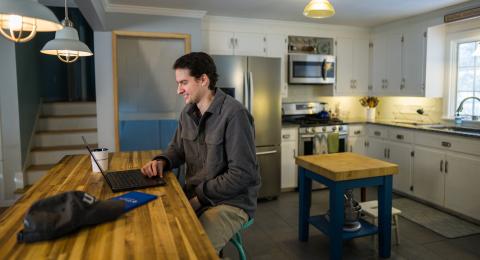 UNH online student working on a class from home