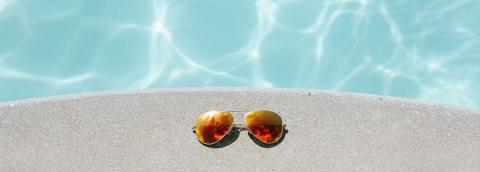 sunglasses by pool