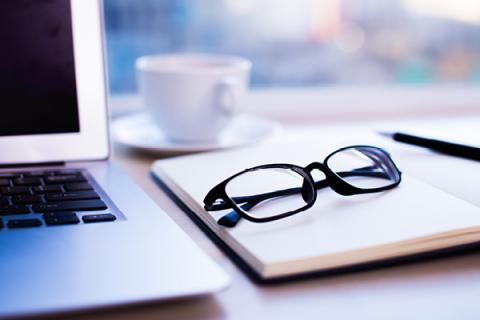 Glasses on notebook