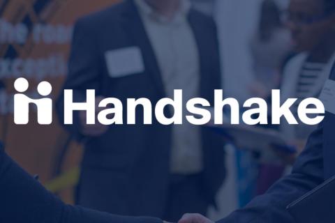 Handshake logo overlaid on businessperson
