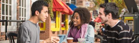 Friends outside a cafe