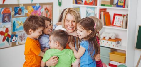 Daycare teacher and students