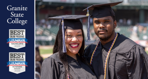 Two graduates posing for photo