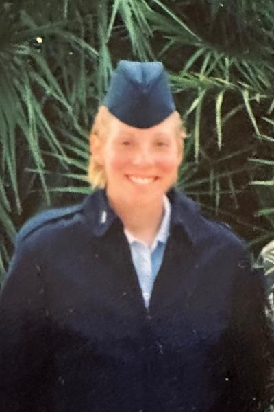 photo of a blonde woman in military uniform
