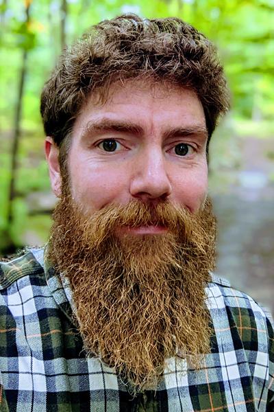 headshot of a Caucasian man with a beard